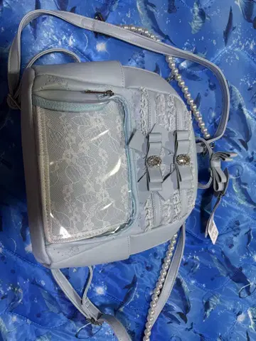 라이트 블루 레이스 장식 백팩