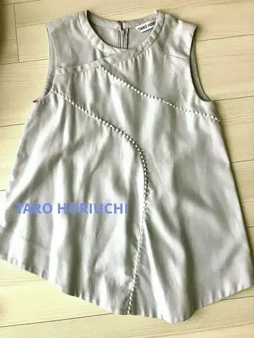 TARO HORIUCHI 슬리브리스 상의