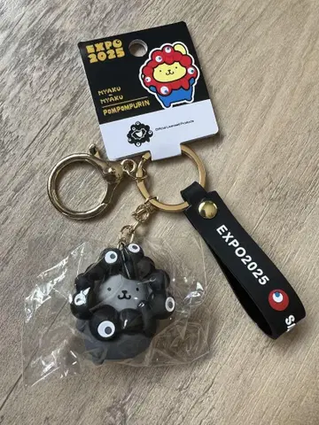 오사카 간사이 엑스포 산리오 블랙 미야쿠미야쿠 키링 폼폼푸딩