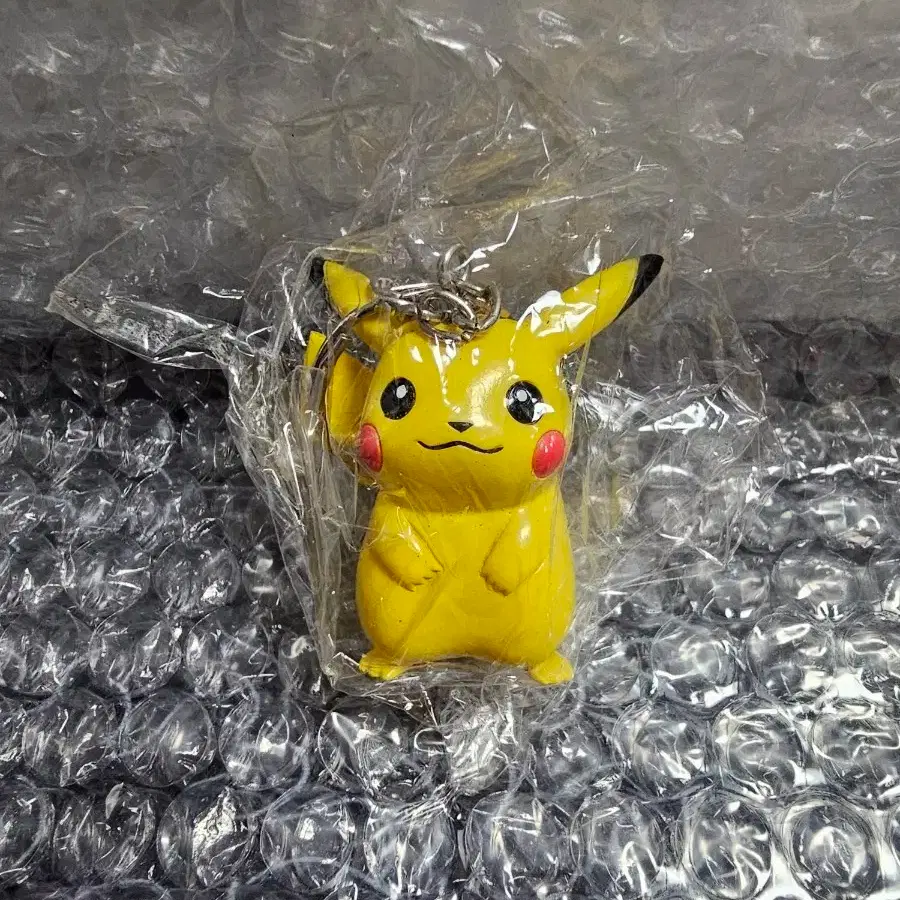 Vintage Pokémon Pikachu mini figure keyring, sealed
