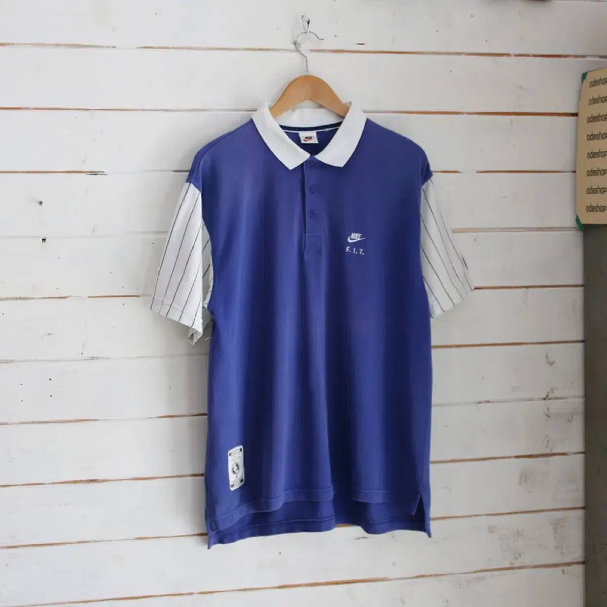 nike supreme court polo