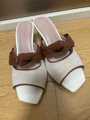 Herlipto Twisted Two-Tone Mules 36