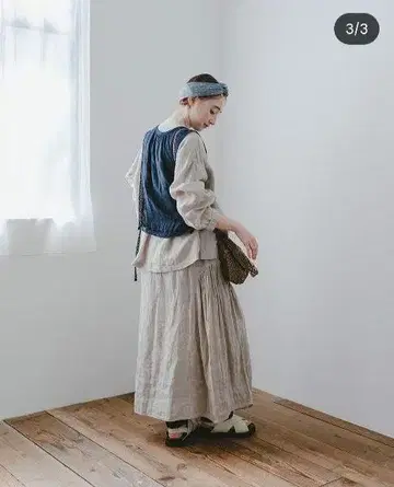 네스트로브 린넨 사이드 개더 맥시 스커트