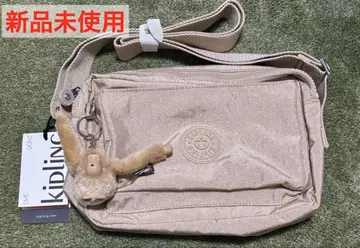 키플링 ABANU M 크로스 바디백 (Sparkled Beige)