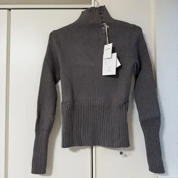 dium. High neck button lib knit tops