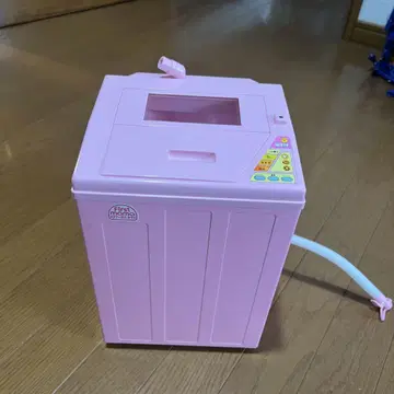 핑크색 세탁기 완구