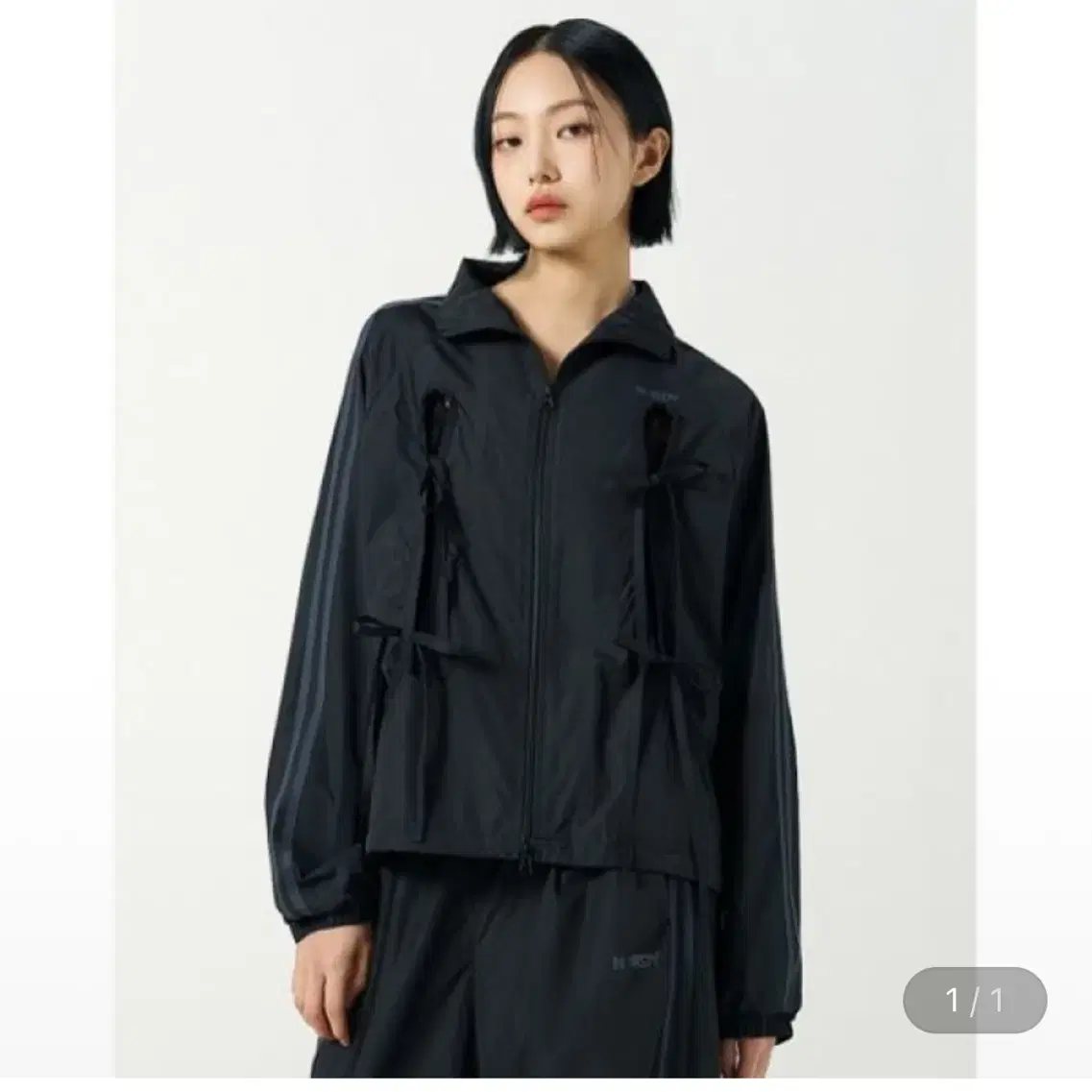 NERDY | 널디 Nerdy Ribbon Tie Track Top Black Windbreaker on