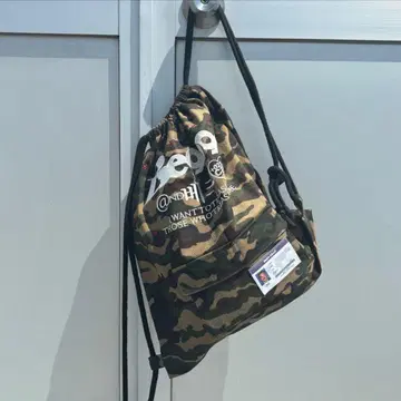 9090 Beck x 9090 Camo Knapsack 냅색