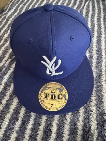 YVL HAT WHITE ON BLUE