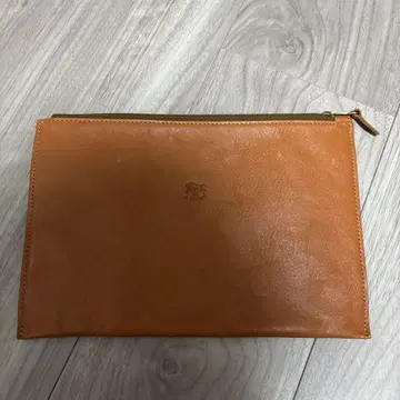 오렌지 가죽 클러치백