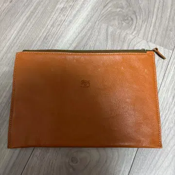 오렌지 가죽 클러치백