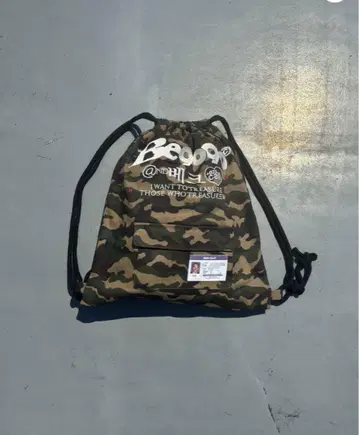 Beck x 9090 Camo Knapsack