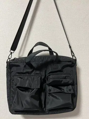 Casper John 멀티 포켓 숄더백