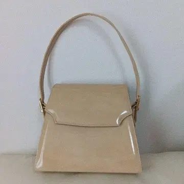 베이지 광택 핸드백