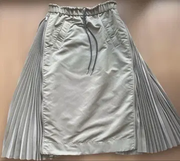 sacai MA-1 나일론 플리츠 스커트