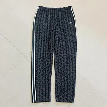 LACOSTE 사이드 테이핑 모노그램 자카드 트랙 팬츠