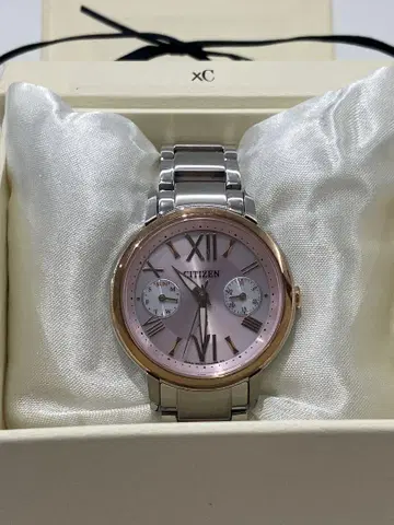 CITIZEN XC 핑크 다이얼 아날로그 시계