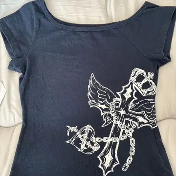9090girl cross logo