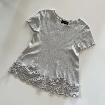 JUSGLITTY 밑단 디자인 니트 튜닉 상의