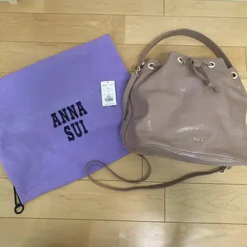 ANNA SUI 베이지 계열 복조리형 숄더백