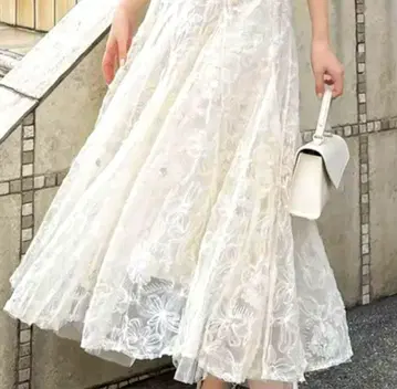 dazzlin 스팽글 샤샤 스커트 아이보리
