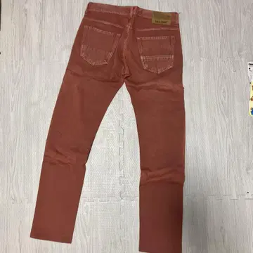 오렌지 슬림핏 데님 팬츠