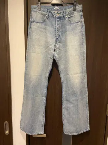 AURALEE SELVEDGE FADED LIGHT DENIM PANTS