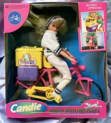 Candi Riding With Her Puppy