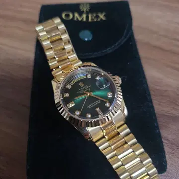 OMEX 골드 그린 다이얼 시계