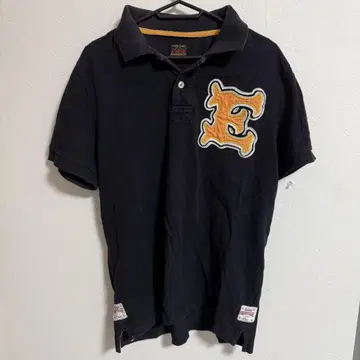 EVISU 빈티지 블랙 자수 E 로고 피케 셔츠