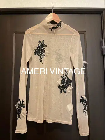 AMERIVINTAGE UND FUR EMBROIDERY SKIN TOP