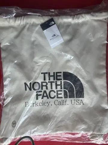 THE NORTH FACE 드로우 스트링 백 크림