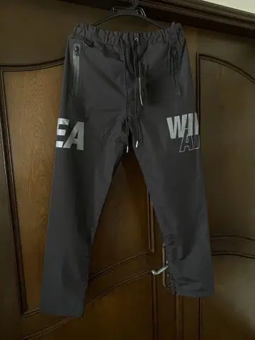WIND AND SEA WATER REPELLENT PANTS BLACK