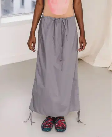 [BASERANGE] PICTORIAL STRAP SKIRT