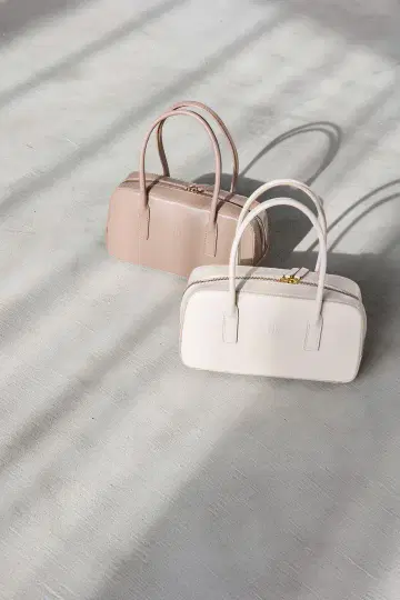 Her lip to Trois Logo Mini Boston Bag