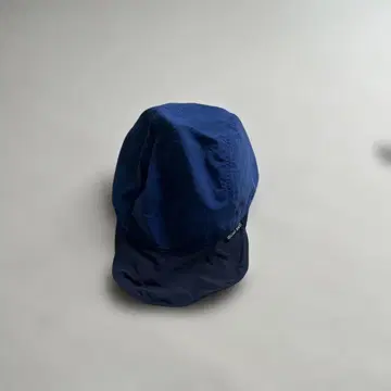 mont-bell 네이비 그레이 투톤 플랩 캡 리버서블