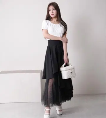 립서비스 라메튤 티어드 플레어 스커트 블랙