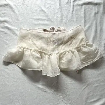 SCULPTOR Peekaboo Micro Sheer Skirt