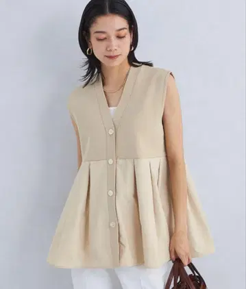 그린 라벨 릴랙싱 도킹 페플럼 니트 베스트