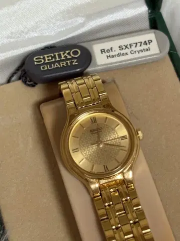 SEIKO SXF774P 골드 쿼츠 손목시계