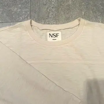 두 번째 클래스 NSF 데미지 가공 칠부 소매 티셔츠