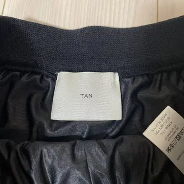 TAN 니트 스커트 프린지 블랙
