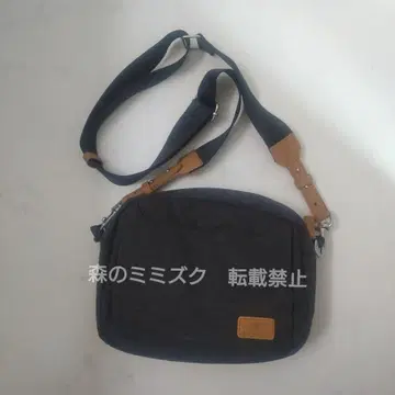 NORDACE 널디스 크로스 바디백 블랙 x 브라운 사선