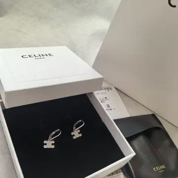 귀걸이 트리옹프 큐빅 흔들리는 타입