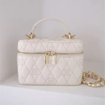 Her lip to Monogram Quilted Vanity Bag