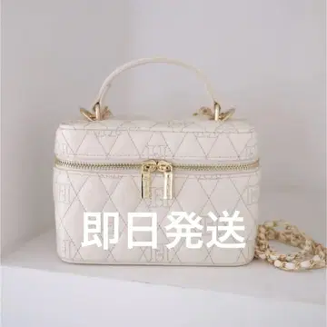 Her lip to Monogram Quilted Vanity Bag