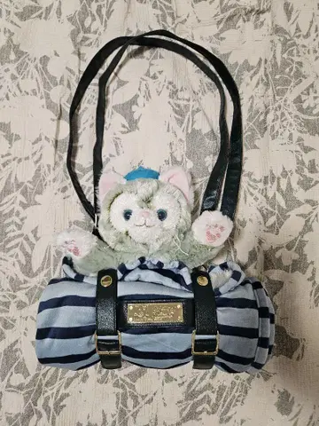 고양이 봉제 인형이 달린 스트라이프 백