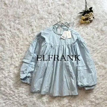 엘프랭크 EL FRANK 백리본 볼륨 슬리브 플레어 블라우스