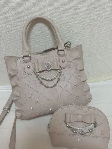 노에미 사키마루짱 백 모노그램 엠보싱 파우치 핑크