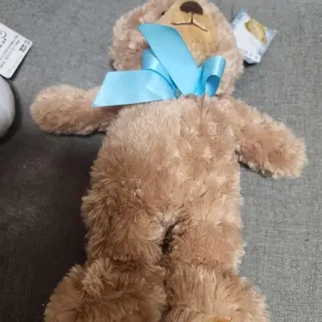 베이지 봉제 인형 스카이블루 리본 포함